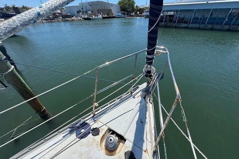 Slide: The Image of Bow of 2005 Beneteau Oceanis Clipper 373 sailboat docked in marina. - 16