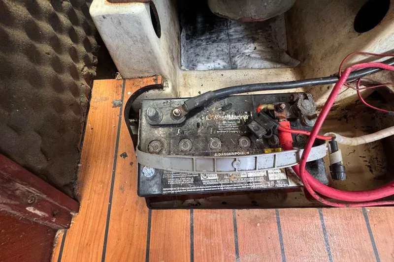 Slide: The Image of Battery compartment of a 2005 Beneteau Oceanis Clipper 373 sailboat with visible wiring. - 39