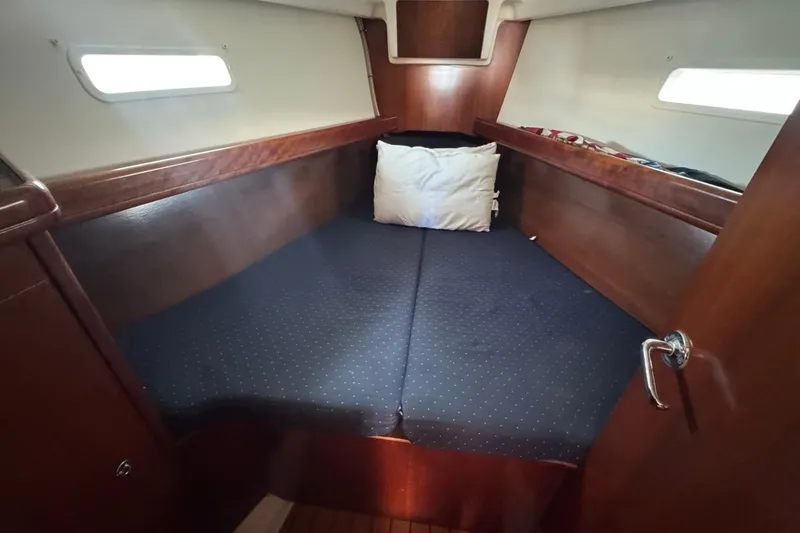 Slide: The Image of Cozy cabin interior of 2005 Beneteau Oceanis Clipper 373 sailboat with wooden finish. - 41