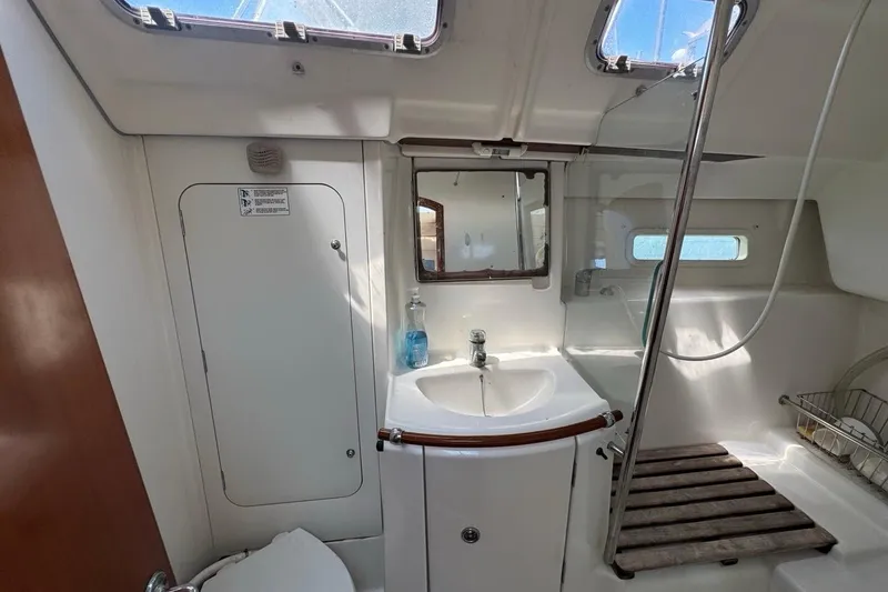 Slide: The Image of Interior of 2005 Beneteau Oceanis Clipper 373 yacht bathroom with sink and shower. - 51