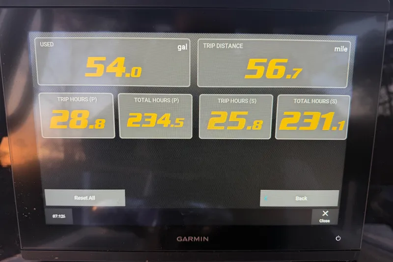 Slide: The Image of Garmin display showing fuel usage and trip data for 2021 Sportsman Heritage 251 Center Console. - 22