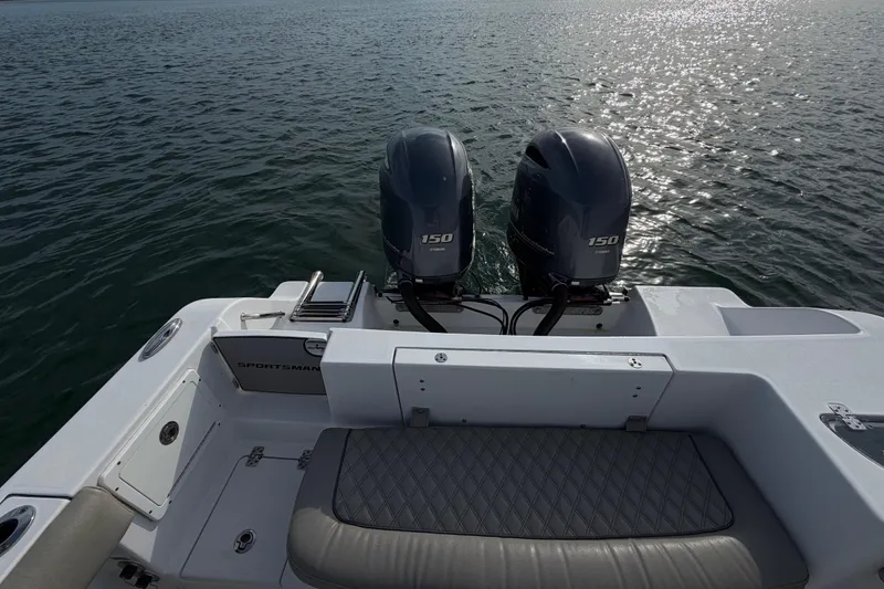 Slide: The Image of 2021 Sportsman Heritage 251 Center Console with twin 150 engines on open water. - 37