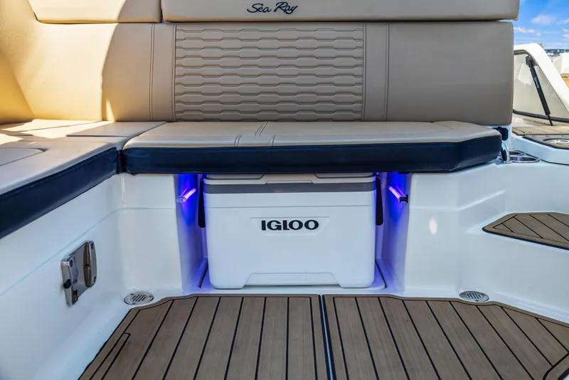 Slide: The Image of 2024 Sea Ray SPX 230 Outboard boat interior with Igloo cooler storage. - 19