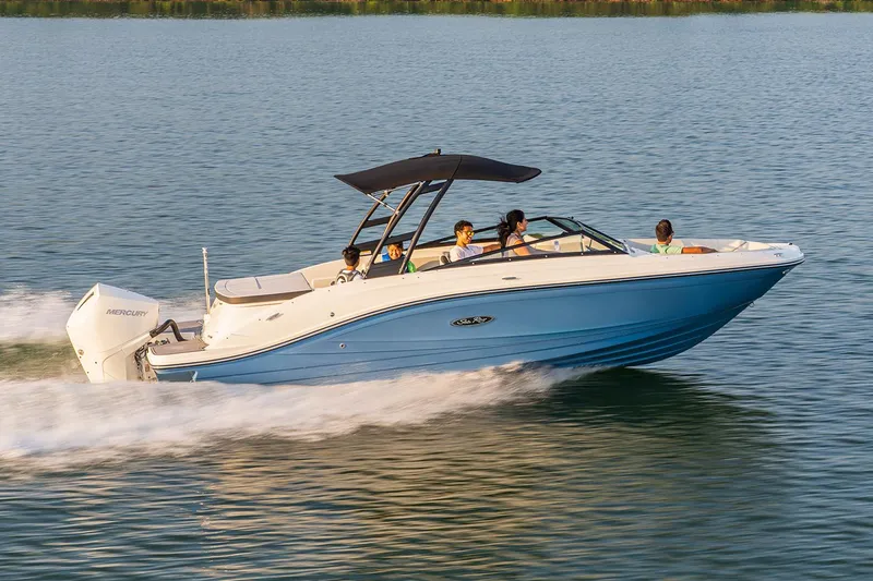 Slide: The Image of 2024 Sea Ray SPX 230 Outboard cruising on a scenic waterway. - 2