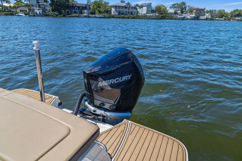 Slide: The Image of 2024 Sea Ray SPX 230 Outboard with Mercury engine on a calm lake. - 33
