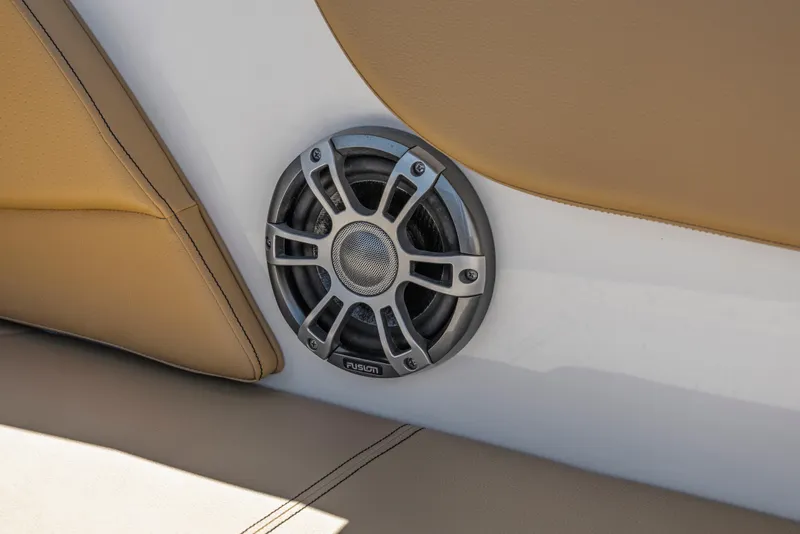 Slide: The Image of 2024 Sea Ray SPX 230 Outboard speaker detail with tan upholstery. - 37
