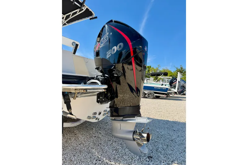 Slide: The Image of 2003 Contender 21 Open boat with powerful 200 HP outboard motor. - 30