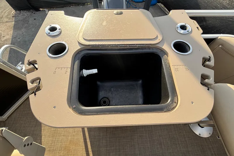 Slide: The Image of 2015 Bennington 20 SSX boat with built-in sink and cup holders. - 20