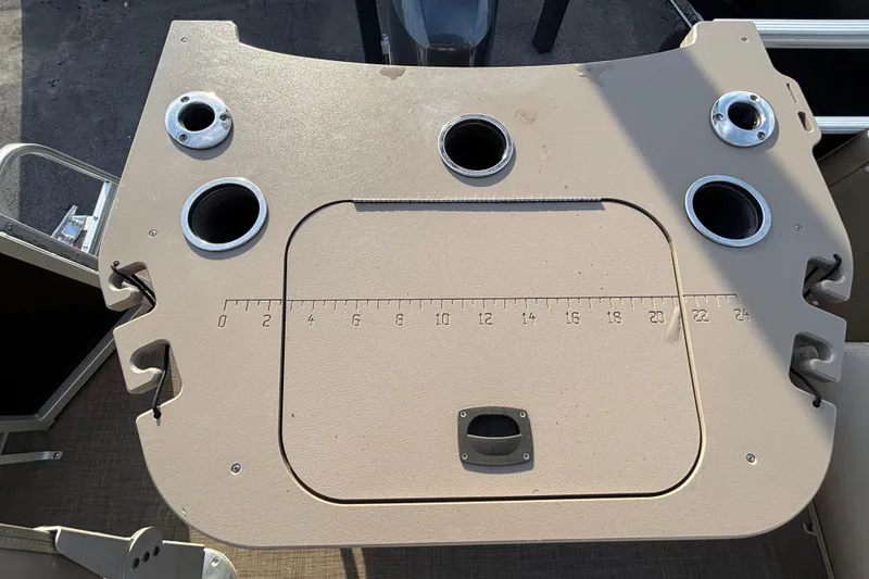 Slide: The Image of 2015 Bennington 20 SSX boat deck with cup holders and measuring scale. - 21