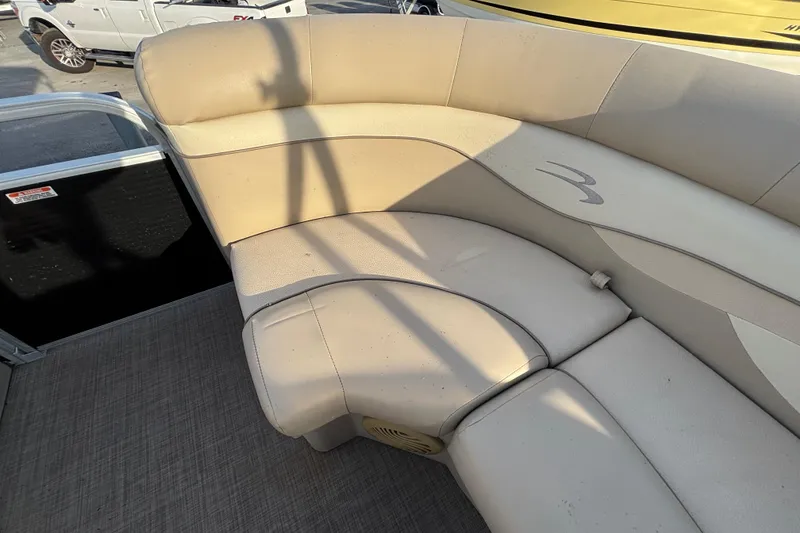 Slide: The Image of Beige seating on 2015 Bennington 20 SSX boat, showcasing comfortable design and upholstery. - 38