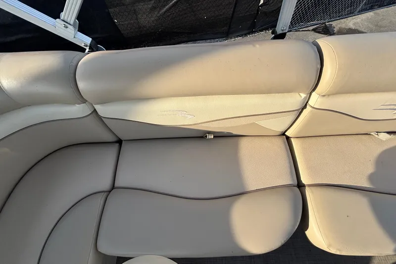Slide: The Image of Beige seating on a 2015 Bennington 20 SSX boat, showing slight wear. - 45