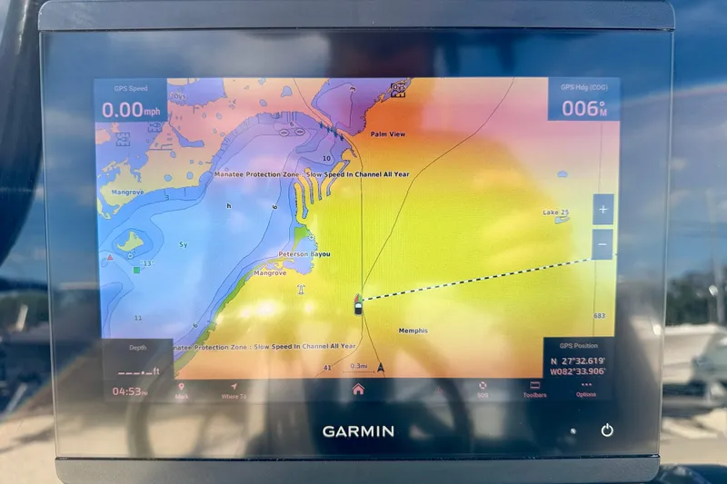 Slide: The Image of Garmin GPS display on 2022 Tidewater 2300 Carolina Bay boat, showing navigation map. - 21