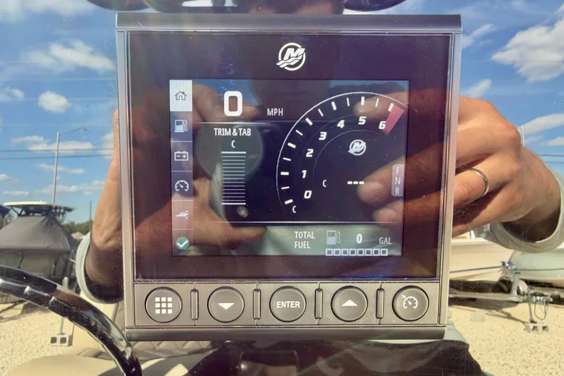 Slide: The Image of Digital dashboard of 2022 Tidewater 2300 Carolina Bay boat, showing speed and fuel indicators. - 23