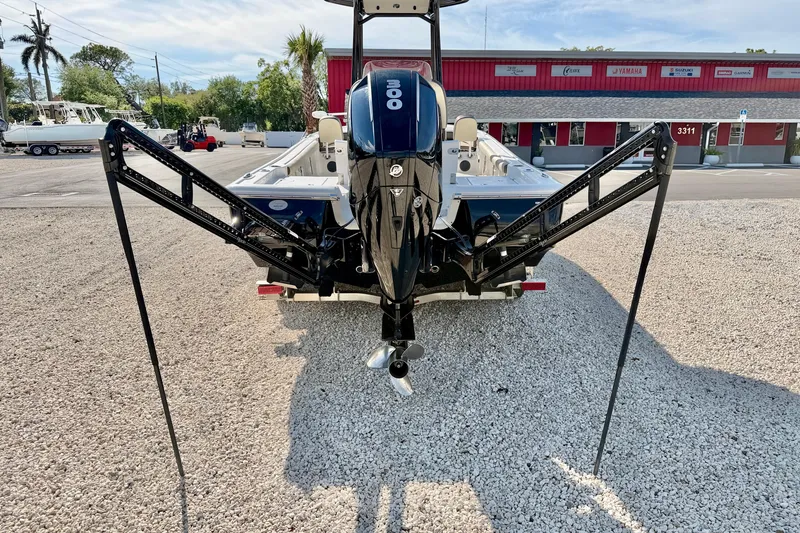 Slide: The Image of 2022 Tidewater 2300 Carolina Bay boat with dual power poles and Mercury engine. - 38