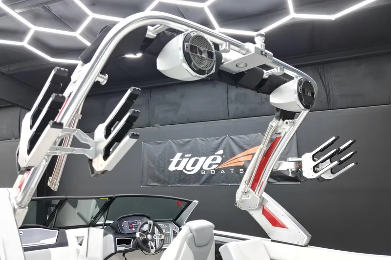 Slide: The Image of 2022 MasterCraft X24 boat interior with advanced wakeboard tower and speakers. - 7