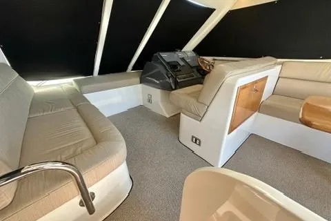 Slide: The Image of Interior of 2007 Maritimo 52 yacht with beige seating and helm station. - 32