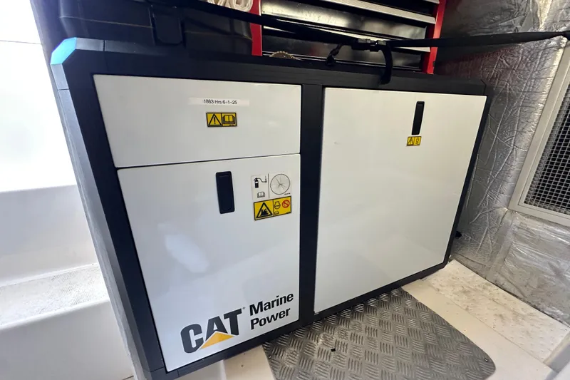 Slide: The Image of CAT Marine Power unit in a 2007 Maritimo 52 yacht engine room. - 48