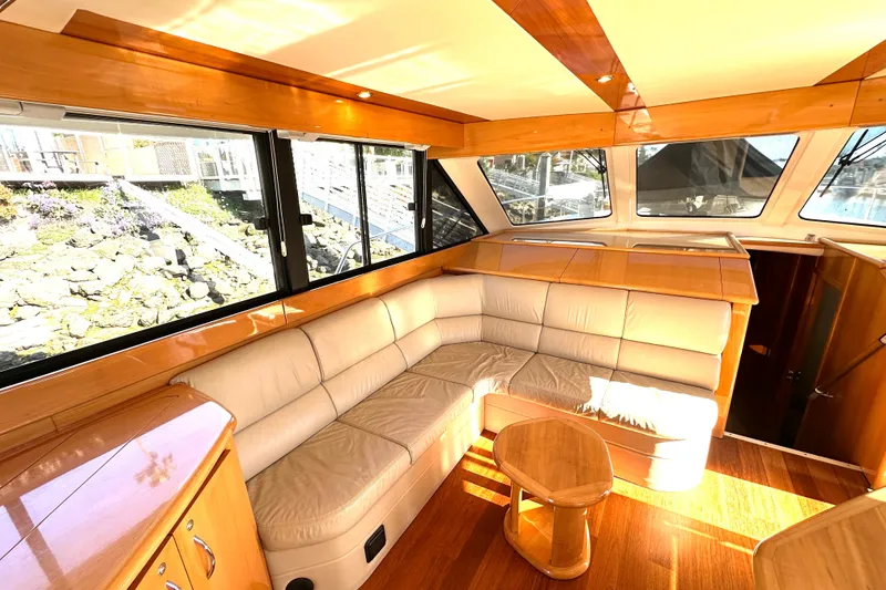Slide: The Image of Luxurious interior of 2007 Maritimo 52 yacht with leather seating and wooden accents. - 8