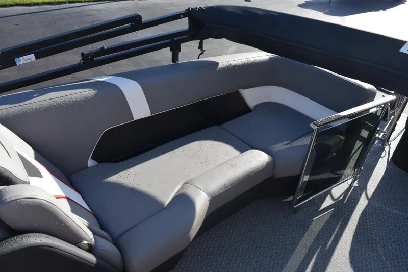 Slide: The Image of 2026 Evotti 723QL boat interior with gray cushioned seating and sleek design. - 14