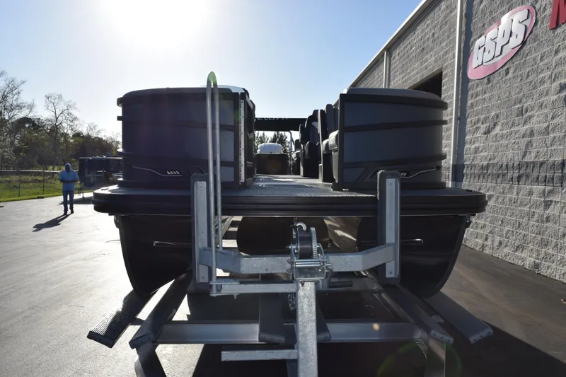 Slide: The Image of Evotti 723QL 2026 model boat on trailer outside GSPS building. - 3