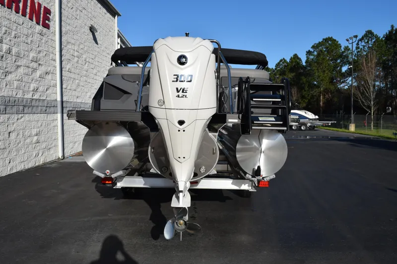 Slide: The Image of 2026 Evotti 723QL boat with powerful 300 V6 4.2L engine, parked outdoors. - 5