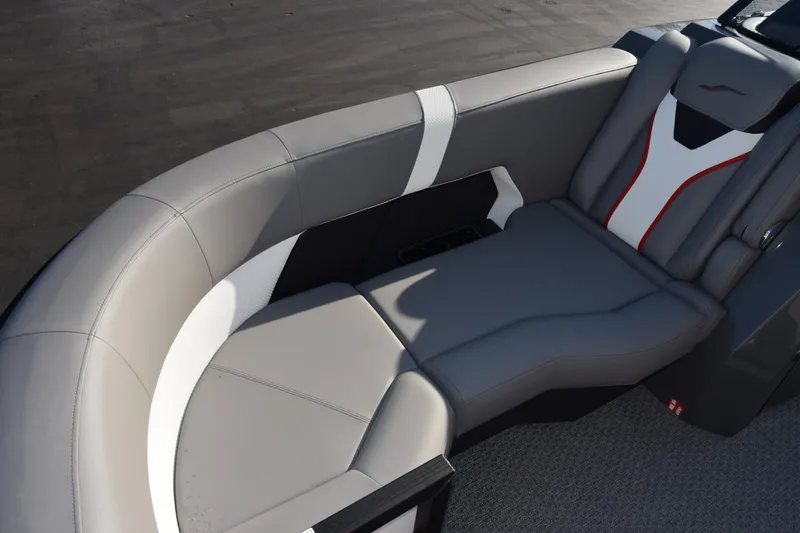 Slide: The Image of Luxurious seating in the 2026 Evotti 721CS boat, featuring sleek gray upholstery. - 12
