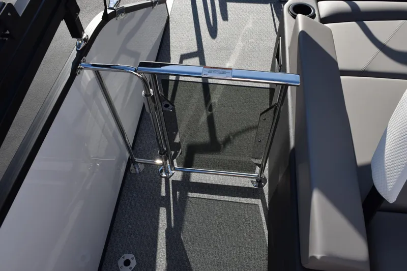 Slide: The Image of Evotti 721CS 2026 boat interior with chrome railing and cushioned seating. - 16