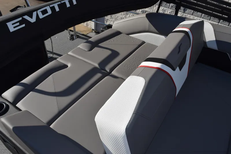 Slide: The Image of 2026 Evotti 721CS boat interior with sleek gray seating and modern design. - 17