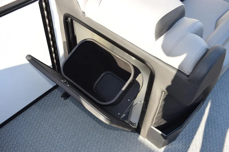 Slide: The Image of Evotti 721CS 2026 boat interior with open storage compartment and seating. - 20