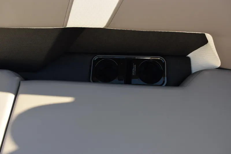 Slide: The Image of Rear seat cup holders in 2026 Evotti 721CS, featuring sleek interior design. - 24
