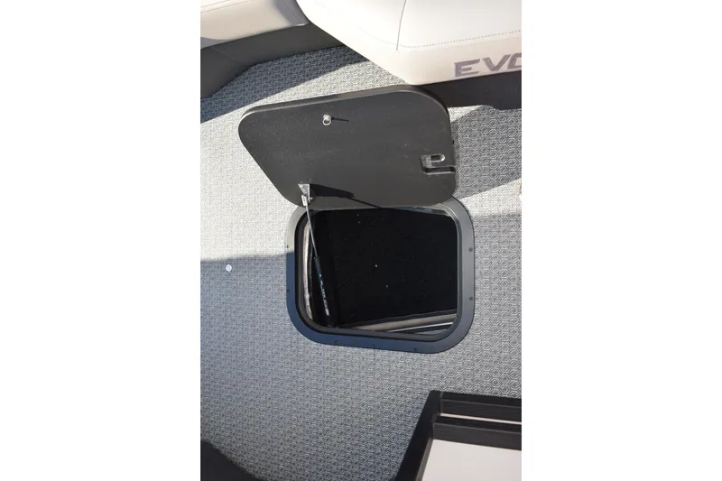 Slide: The Image of Open hatch on Evotti 721CS boat, 2026 model, showing interior storage compartment. - 25