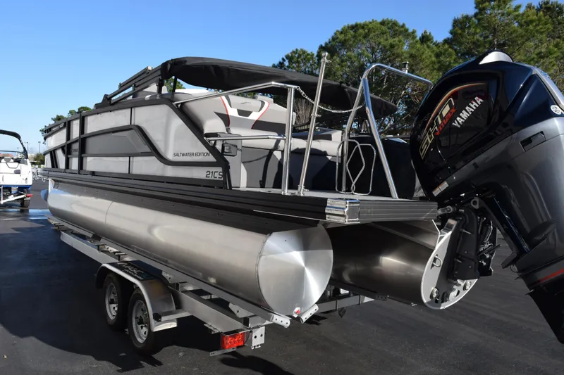 Slide: The Image of 2026 Evotti 721CS pontoon boat with Yamaha engine on trailer. - 6