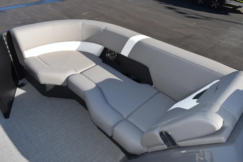 Slide: The Image of Luxurious seating on 2026 Evotti 521CS boat, featuring sleek gray and white upholstery. - 10