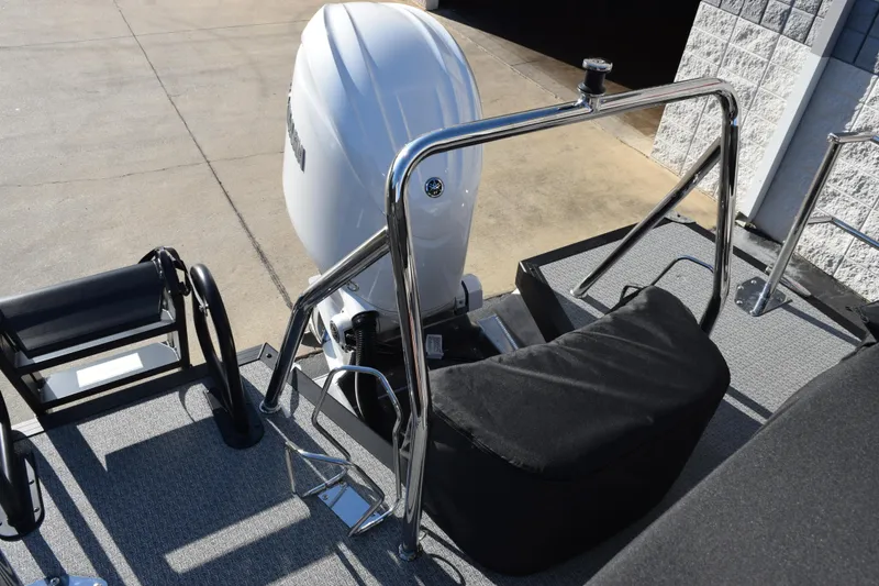 Slide: The Image of 2026 Evotti 521CS boat with sleek outboard motor and stainless steel railing. - 16