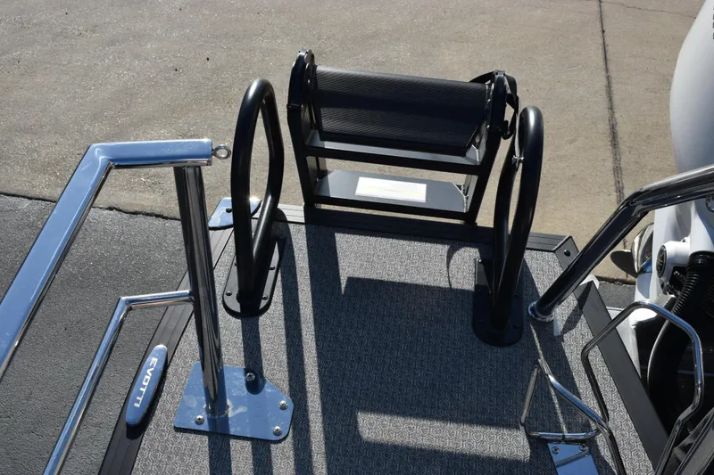 Slide: The Image of Evotti 521CS 2026 boat deck with sleek metal railings and textured flooring. - 17