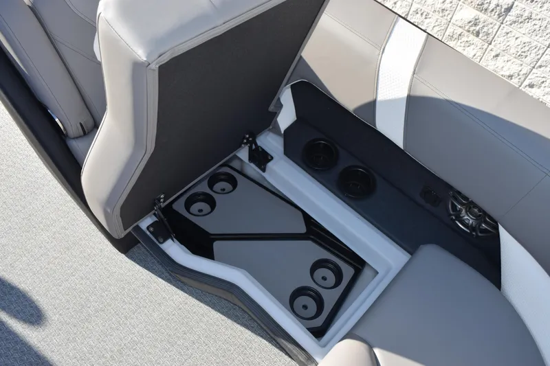 Slide: The Image of 2026 Evotti 521CS boat seat storage with cup holders and speaker. - 20