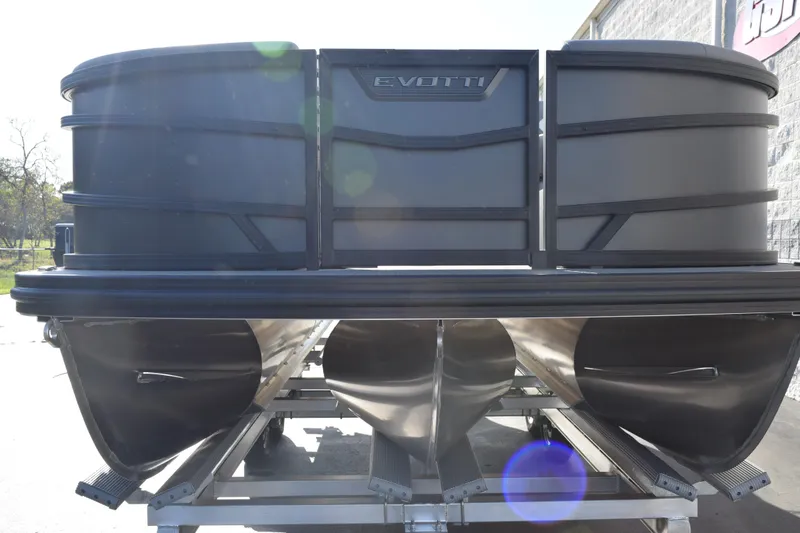 Slide: The Image of Front view of a 2026 Evotti 521CS pontoon boat, showcasing sleek design and structure. - 3