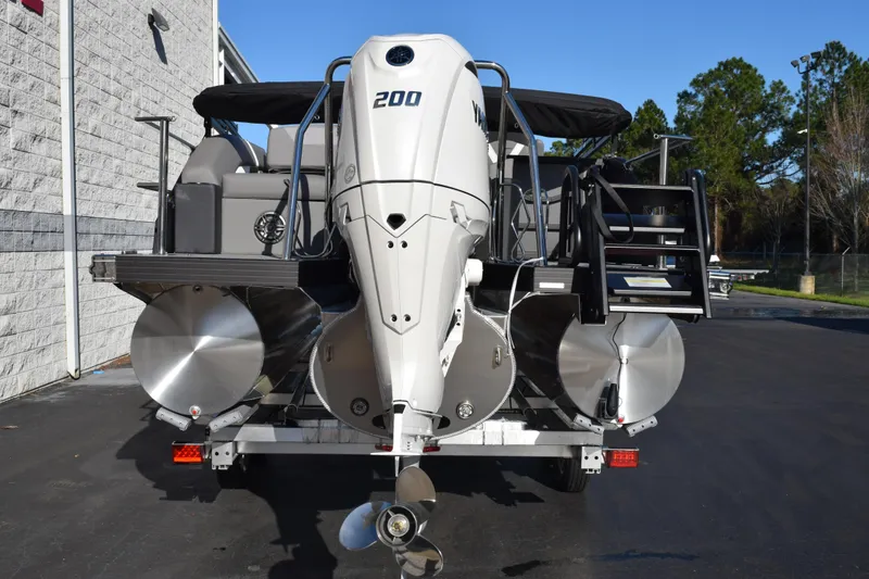 Slide: The Image of Rear view of 2026 Evotti 521CS pontoon boat with powerful outboard motor. - 5