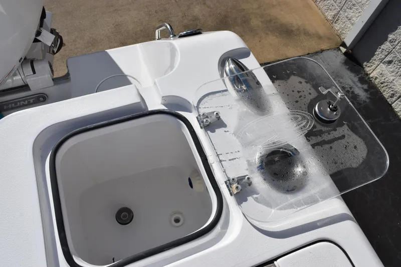 Slide: The Image of 2026 Sea Hunt Gamefish 25 boat's livewell and bait station detail. - 21