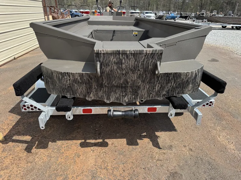 Slide: The Image of Reaper Boats 656 STEP TRANSOM 2026 on trailer, rear view. - 5