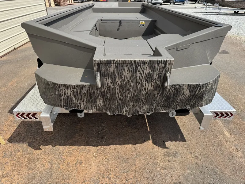 Slide: The Image of Reaper Boats 756 STEP TRANSOM 2026 on trailer, rear view. - 4