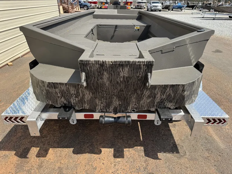 Slide: The Image of Reaper Boats 756 STEP TRANSOM 2026 on trailer, rear view. - 6