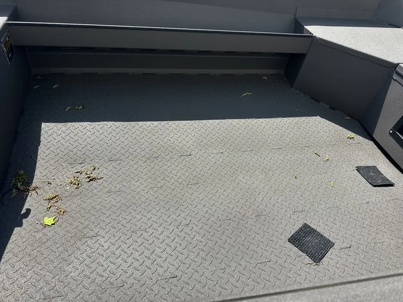 Slide: The Image of Interior of a 2026 Reaper Boats 550 with non-slip flooring. - 3