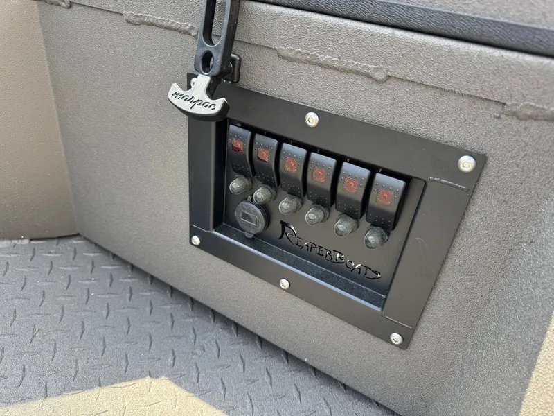 Slide: The Image of Control panel of a 2026 Reaper Boats 756 STEP TRANSOM. - 7