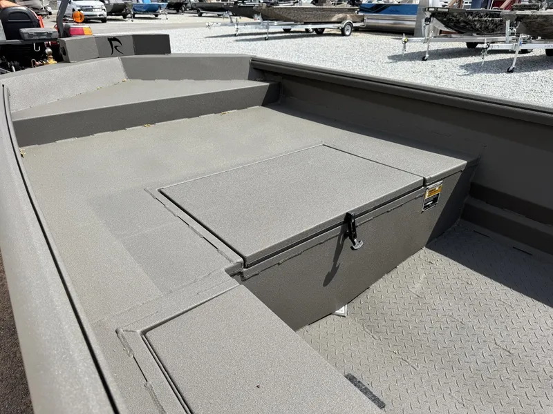 Slide: The Image of Reaper Boats 656 STEP TRANSOM 2026 with storage compartment and durable design. - 3