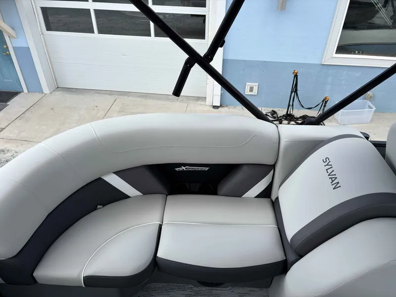 Slide: The Image of Sylvan X-1 DH 2026 boat seating with modern design. - 11