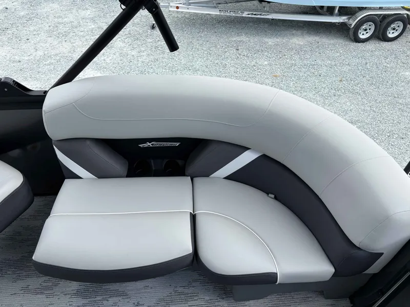 Slide: The Image of Sylvan X-1 DH 2026 boat seat with gray upholstery. - 12