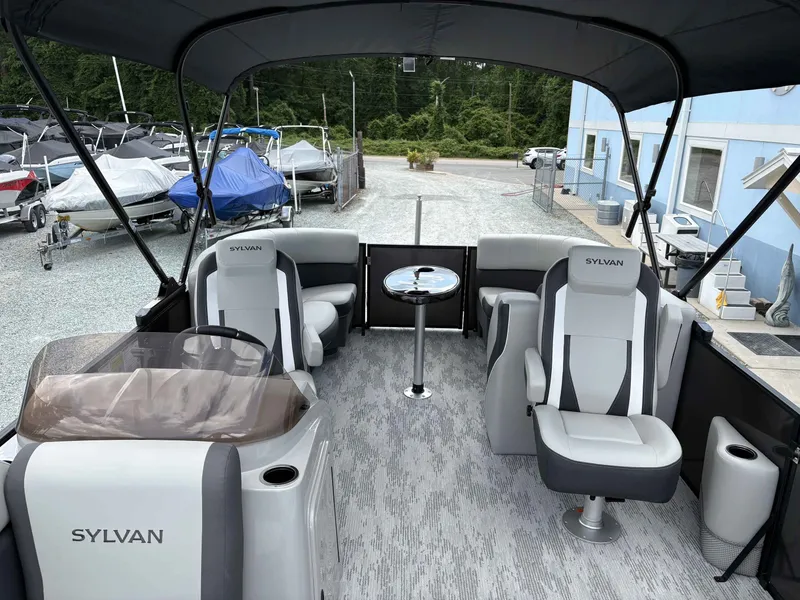 Slide: The Image of Interior of 2026 Sylvan X-1 DH pontoon boat with luxurious seating. - 8