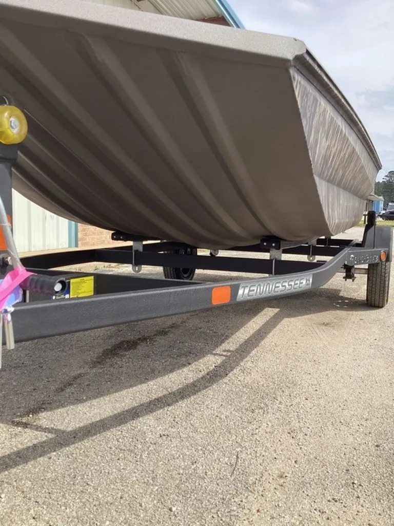 Slide: The Image of Reaper Boats 653-STEP 2026 on trailer, side view. - 17