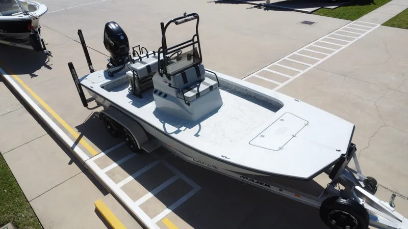 Slide: The Image of 2024 Majek 21RFL boat on trailer, aerial view. - 17